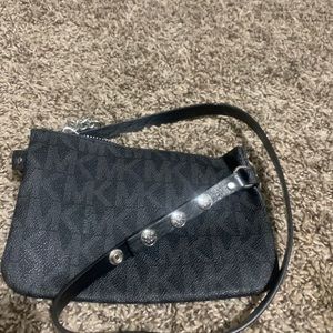 Signature Michael Kors clutch bag